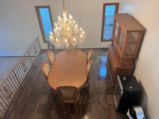 1006 North Delphia Avenue Park Ridge, IL 60068 - Photo 4 of 28 a view of a dining room with furniture and wooden floor