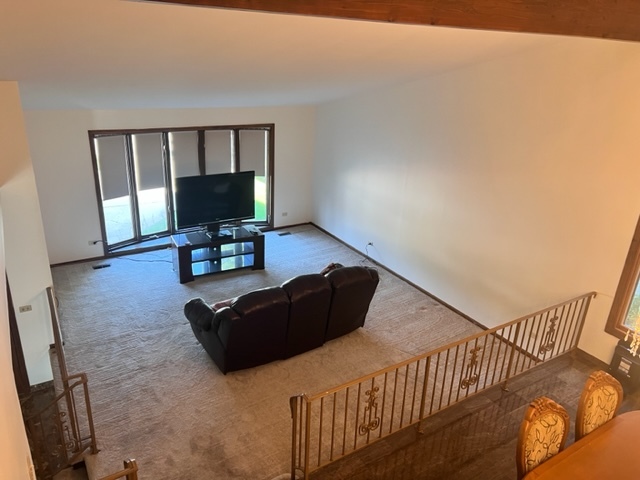 1006 North Delphia Avenue Park Ridge, IL 60068 - Photo 5 of 28 a living room with furniture and a window