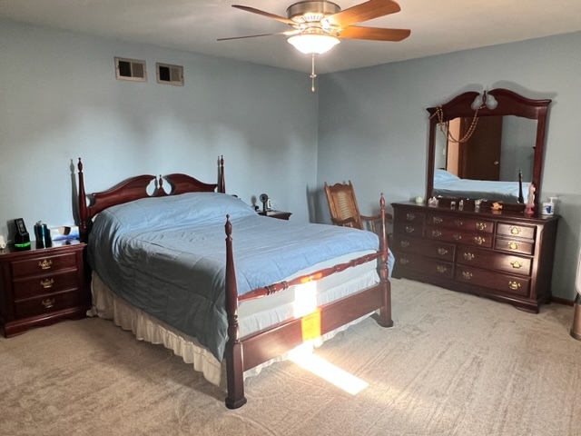 1006 North Delphia Avenue Park Ridge, IL 60068 - Photo 10 of 28 a bedroom with a bed and a dresser