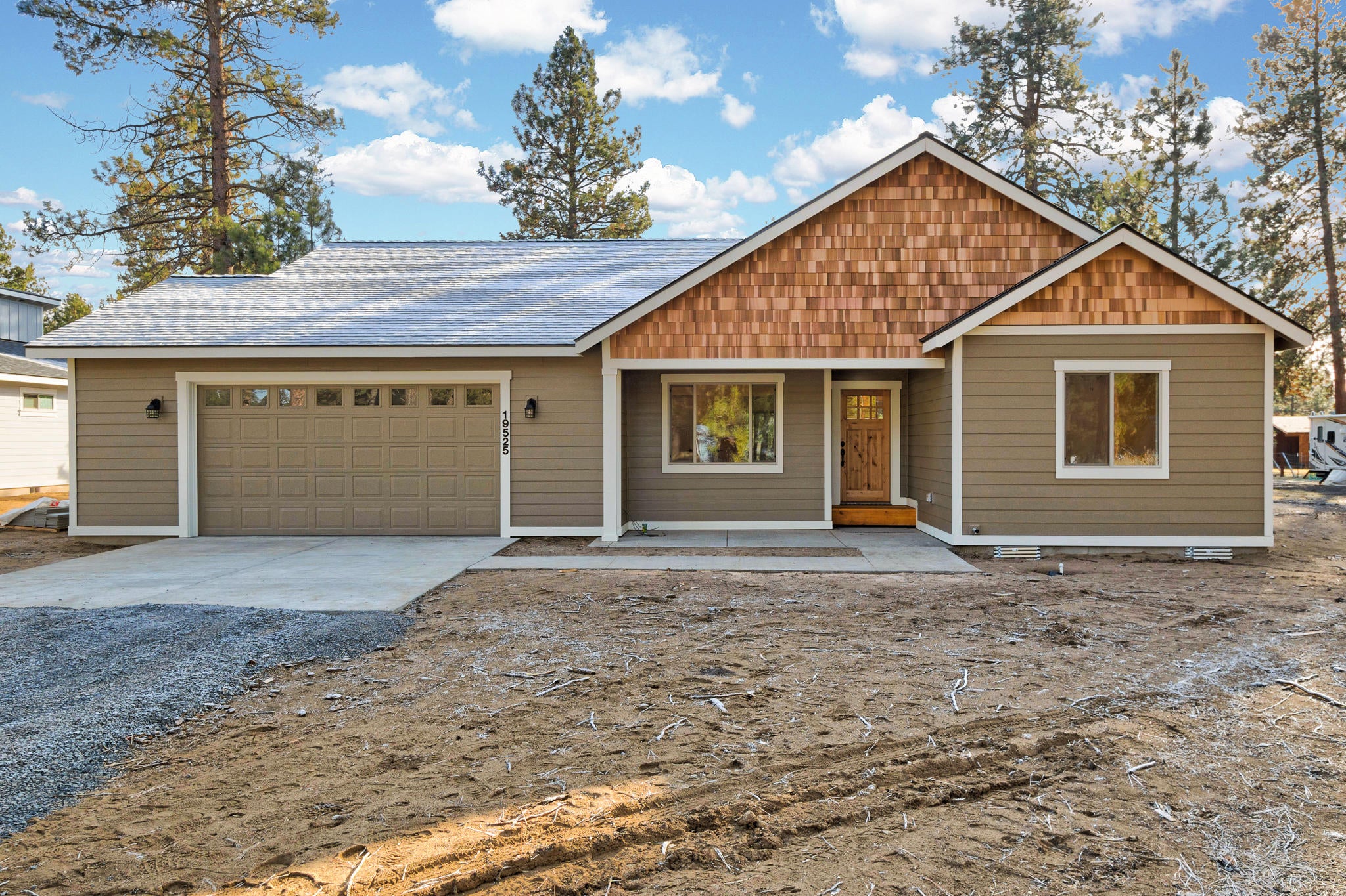 60126 Turquoise Road Bend, OR 97702 - Photo 5 of 18 Not picture of actual home, this is from a previous home that this builder constructed. See floor plan flooring image and cabinet image for changes made.