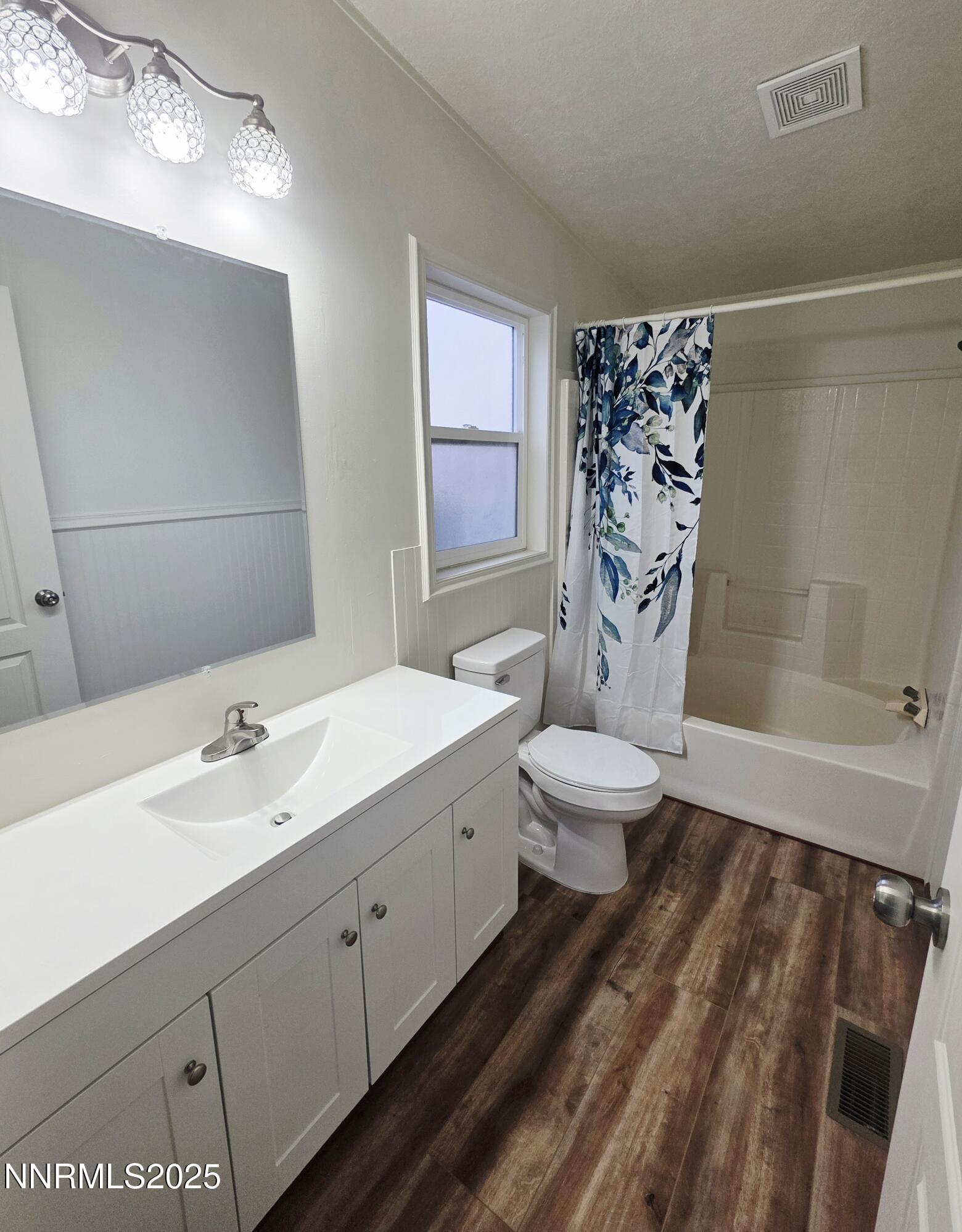 3146 Lone Tree Road Fallon, NV 89406 - Photo 16 of 23 a bathroom with a double vanity sink toilet and shower