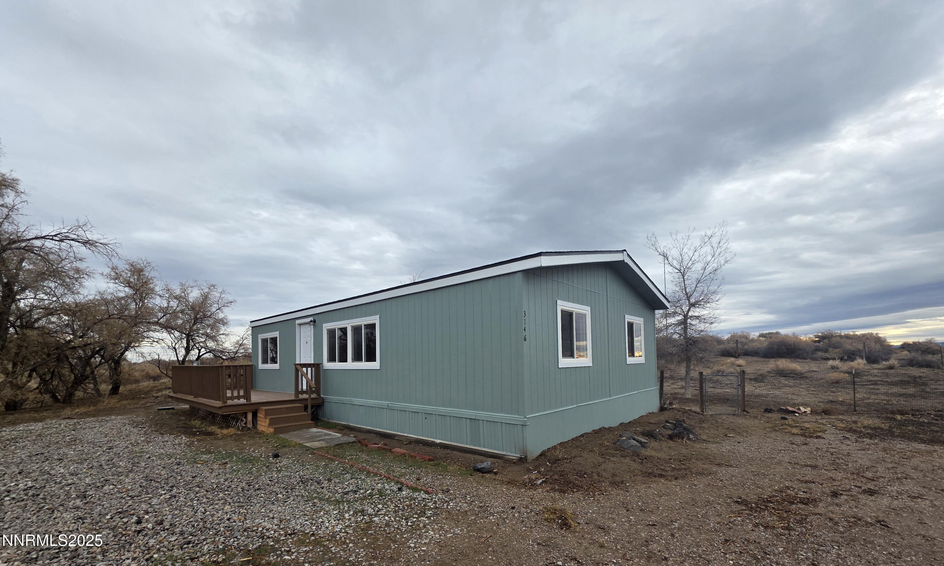 3146 Lone Tree Road Fallon, NV 89406 - Photo 3 of 23 a house with a outdoor space