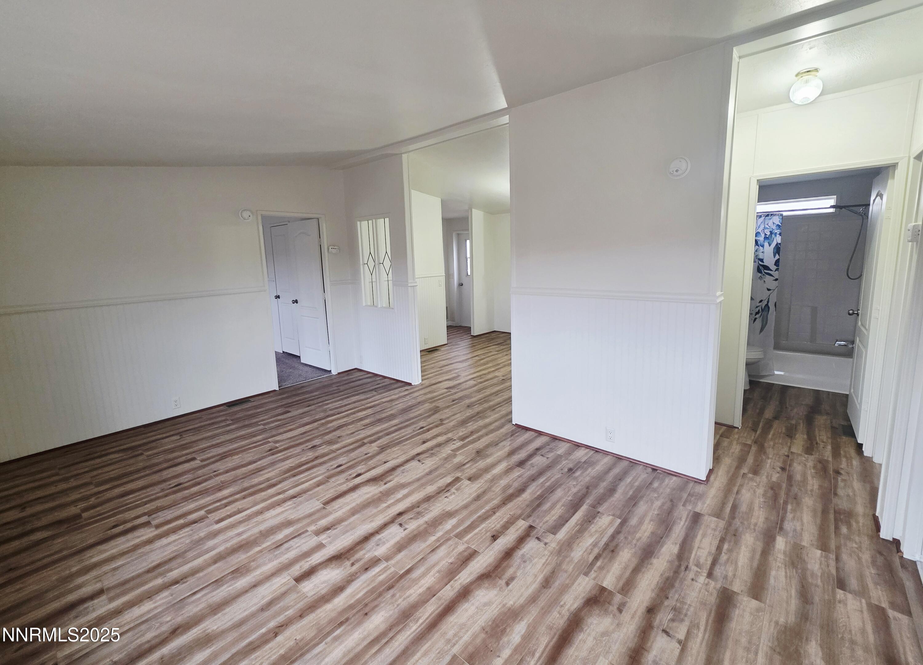 3146 Lone Tree Road Fallon, NV 89406 - Photo 6 of 23 a view of a room with wooden floor and a sink