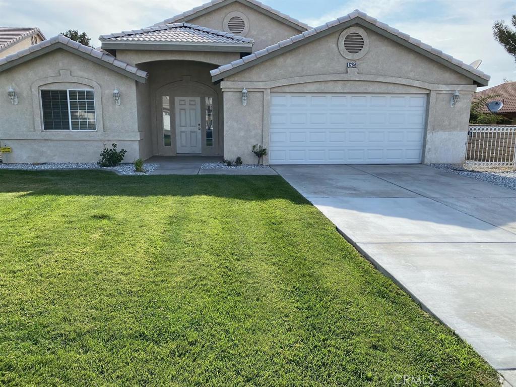 12858 Rain Shadow Road Victorville, CA 92395 - Photo 2 of 15 a view of outdoor space yard and garage