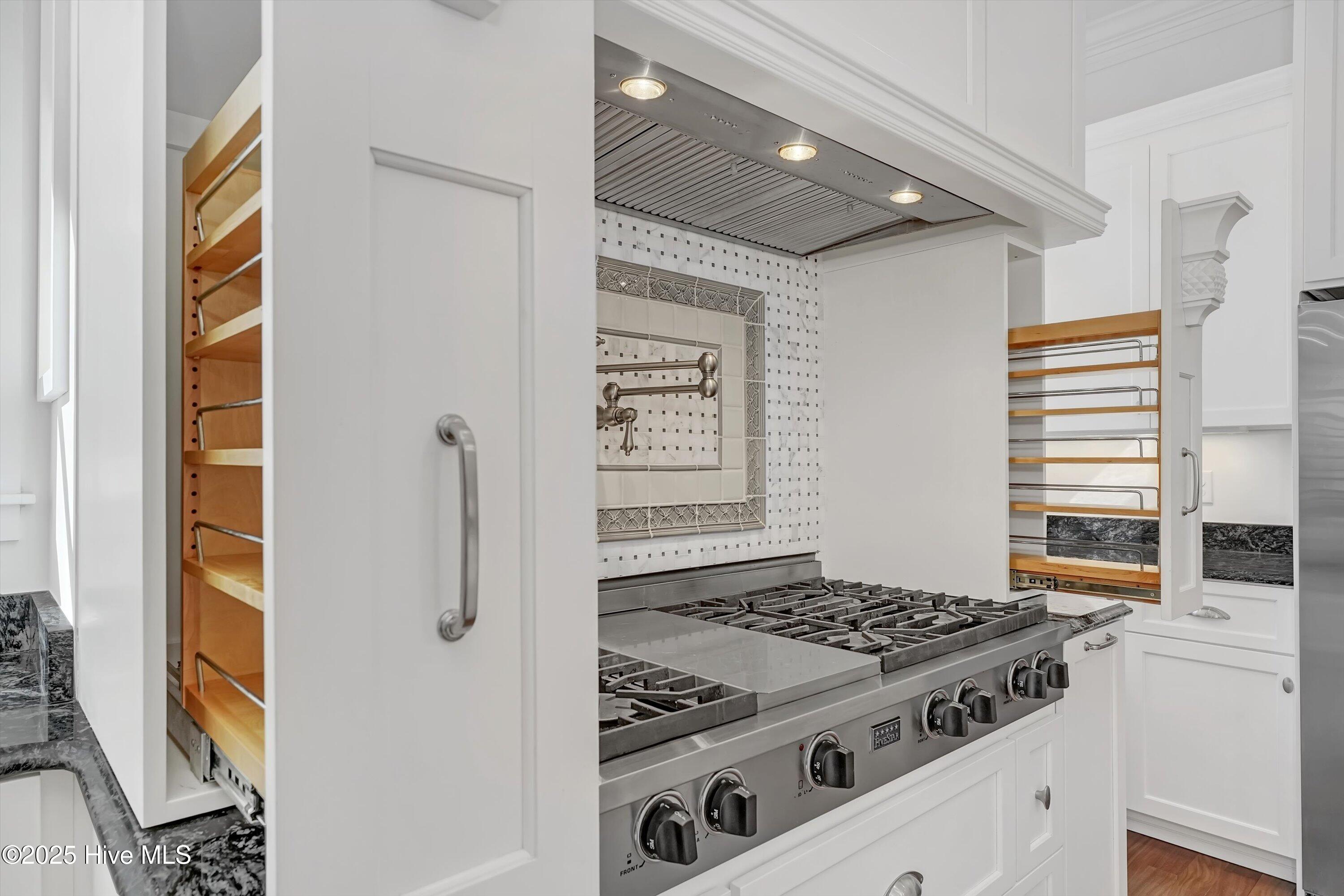 354 River Wynd Drive Shallotte, NC 28470 - Photo 30 of 80 range/ spice cabinets