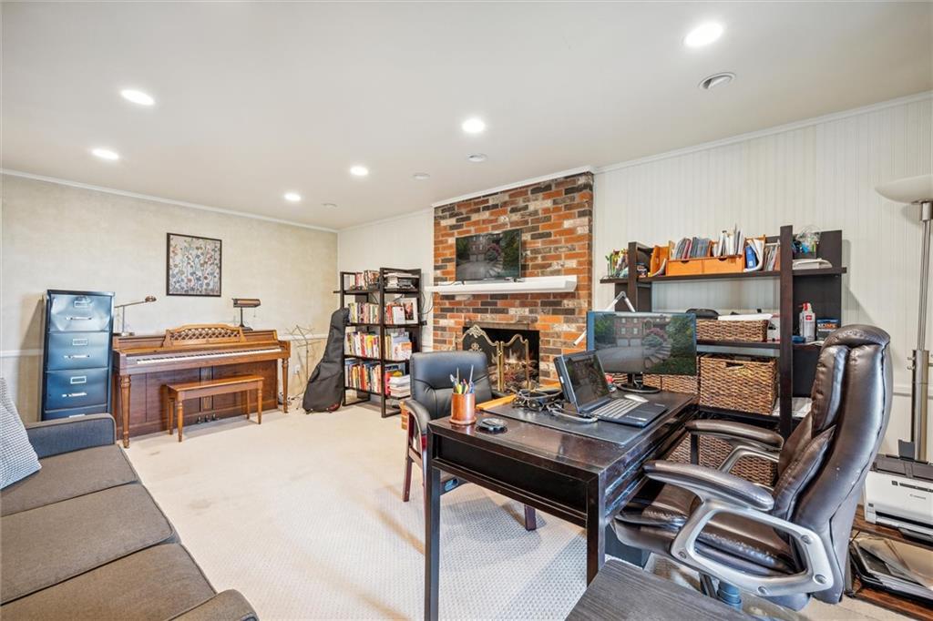 2336 Mill Grove Road Pittsburgh, PA 15241 - Photo 22 of 44 a room with furniture a flat screen tv and a table