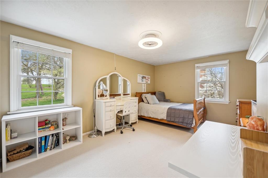 2336 Mill Grove Road Pittsburgh, PA 15241 - Photo 24 of 44 a bedroom with furniture and a window