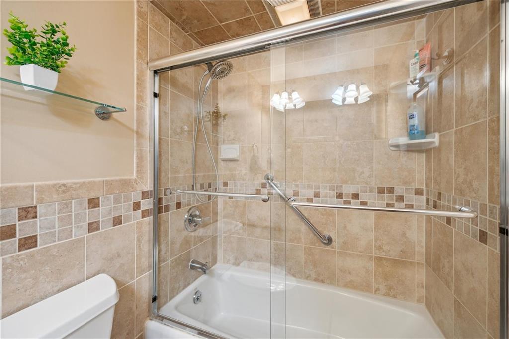 2336 Mill Grove Road Pittsburgh, PA 15241 - Photo 27 of 44 a bathroom with a bathtub and a shower