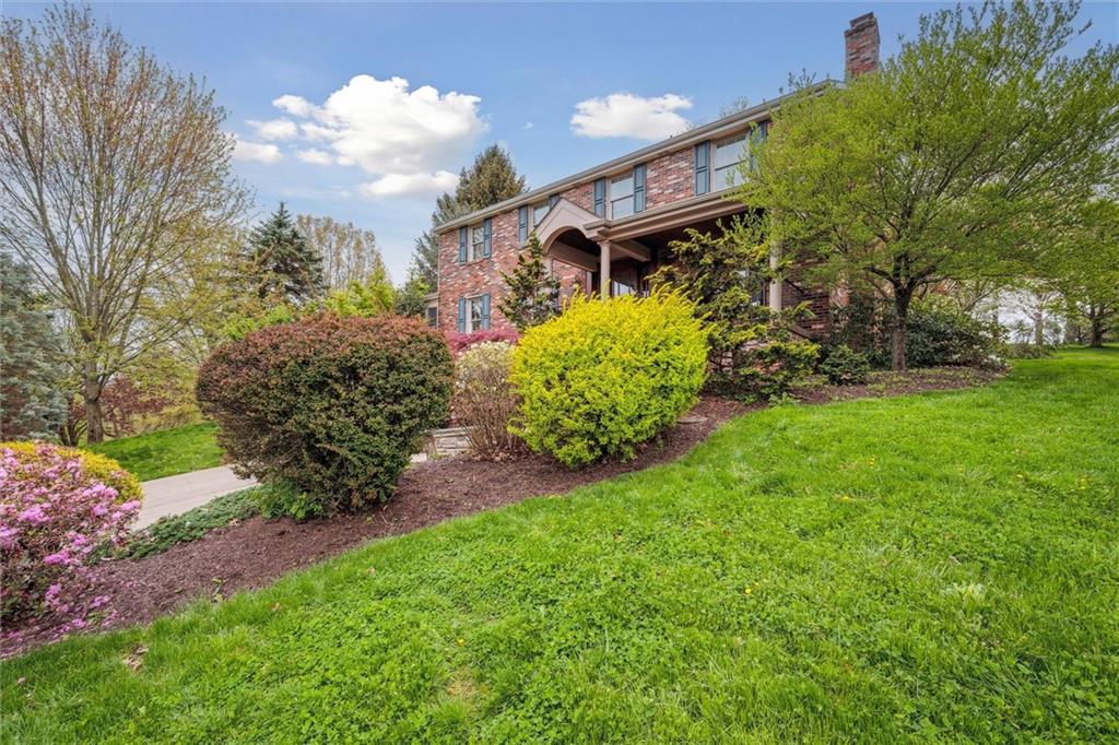 2336 Mill Grove Road Pittsburgh, PA 15241 - Photo 3 of 44 a front view of a house with garden