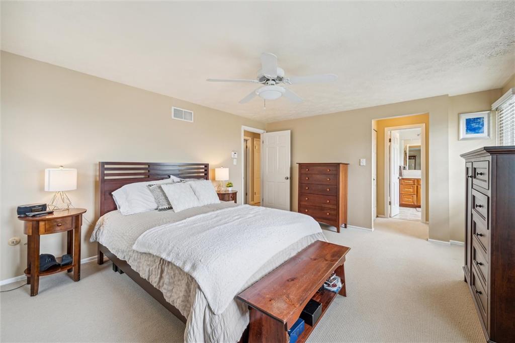 2336 Mill Grove Road Pittsburgh, PA 15241 - Photo 31 of 44 a bedroom with a bed and a dresser