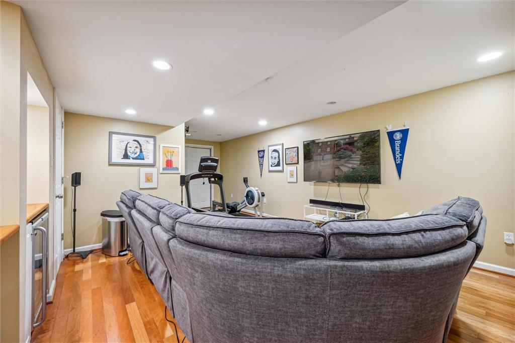 2336 Mill Grove Road Pittsburgh, PA 15241 - Photo 37 of 44 a living room with furniture and a flat screen tv