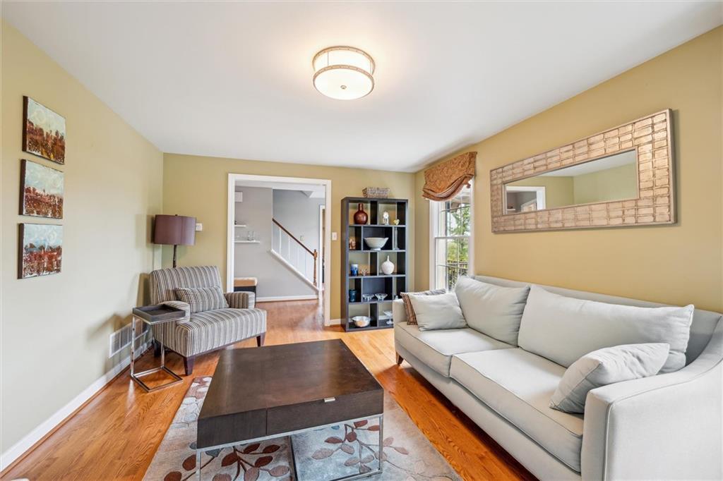 2336 Mill Grove Road Pittsburgh, PA 15241 - Photo 9 of 44 a living room with furniture and a wooden floor