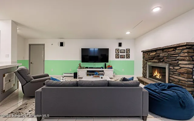 a kitchen with granite countertop a stove and a sink