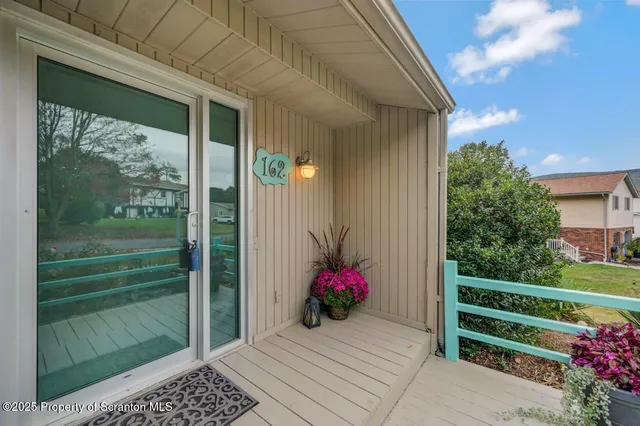 a kitchen with granite countertop a stove and a sink