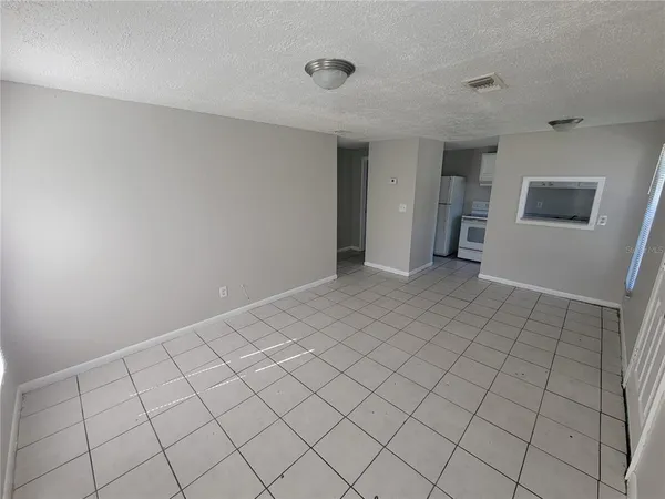a view of a storage & utility room with washing machine