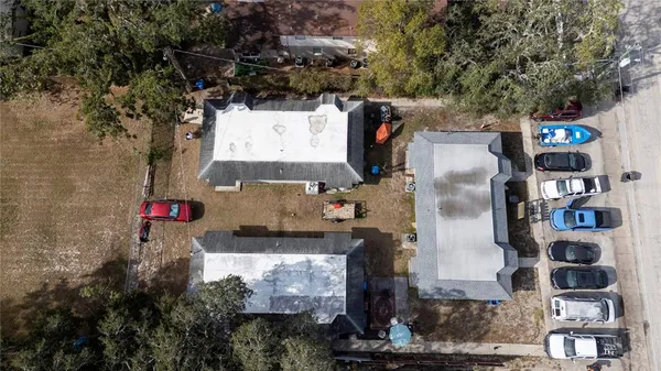 a view of a patio with table and chairs