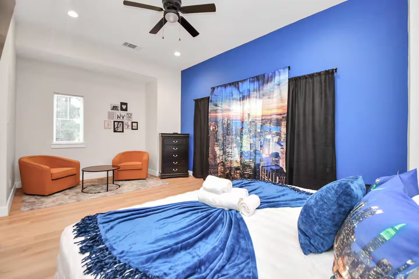 5718 Beall Street, Unit D Houston, TX 77091 - Photo 13 of 41 a bedroom with furniture and a large window