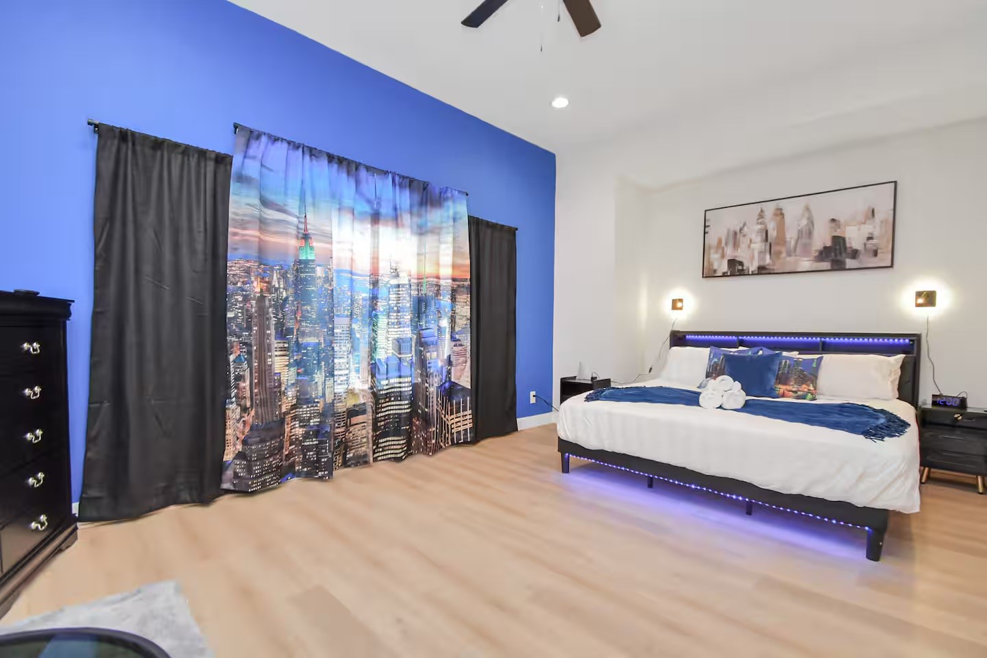 5718 Beall Street, Unit D Houston, TX 77091 - Photo 15 of 41 a bedroom with a large bed and a large window