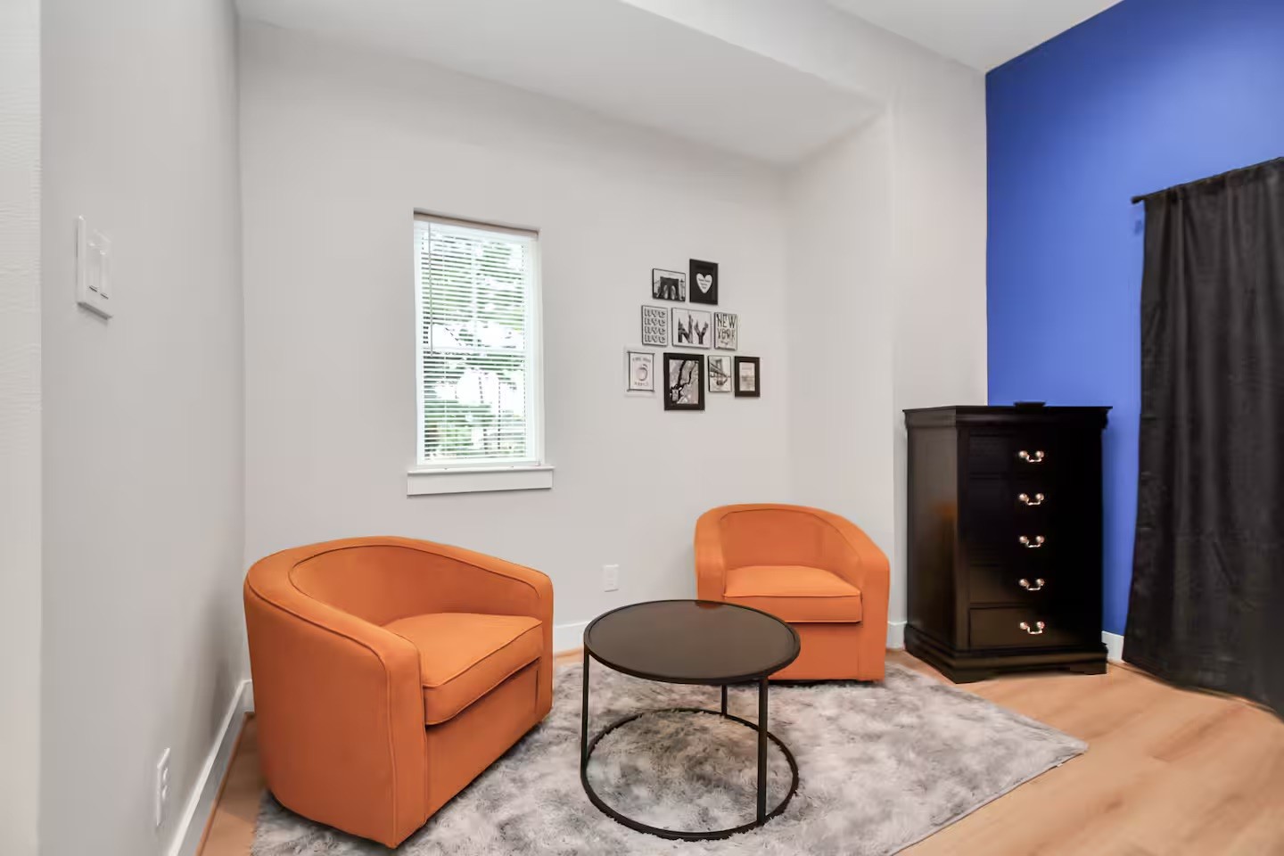 5718 Beall Street, Unit D Houston, TX 77091 - Photo 18 of 41 a living room with furniture and a lamp