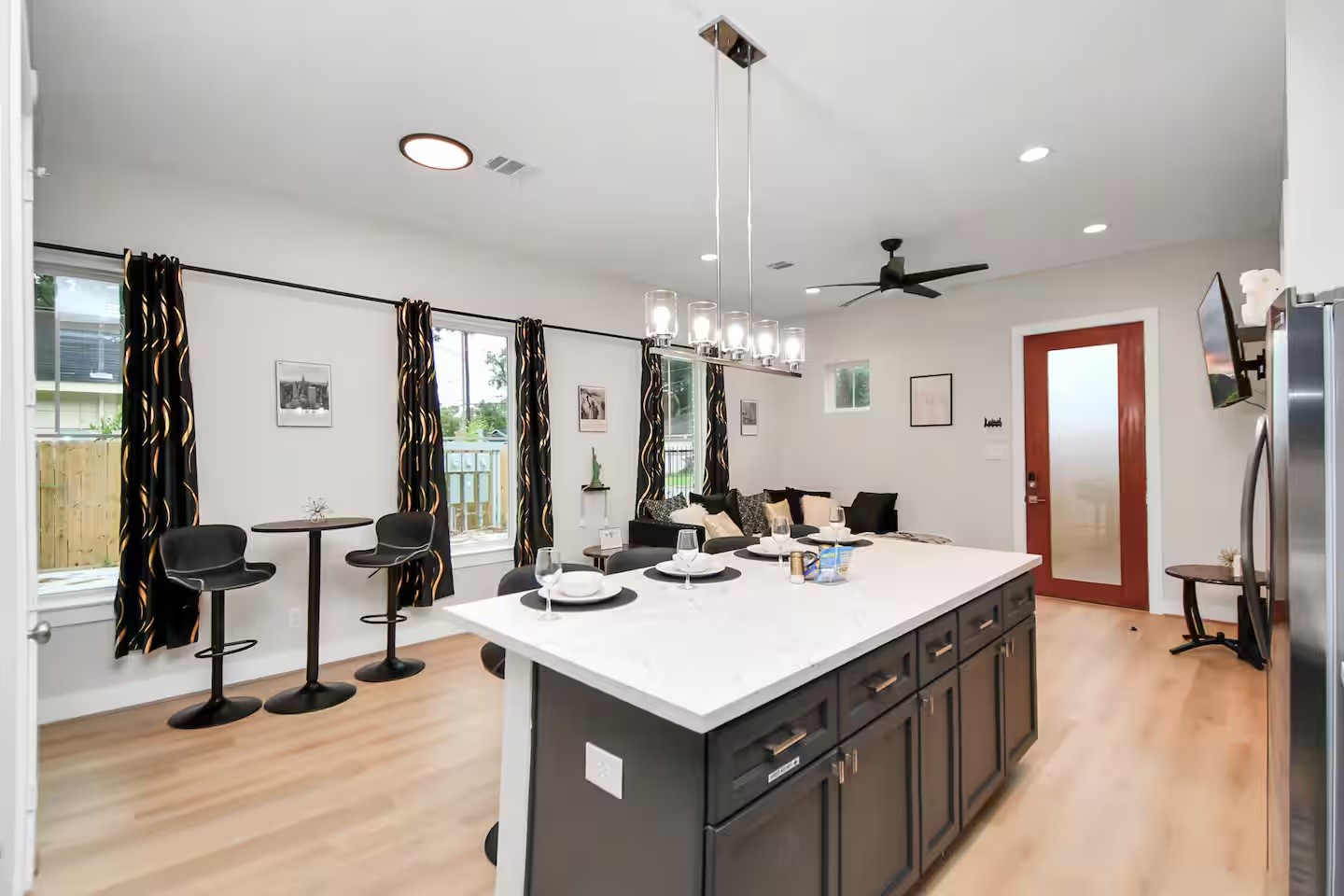 5718 Beall Street, Unit D Houston, TX 77091 - Photo 2 of 41 a kitchen with a sink a counter top space and stainless steel appliances