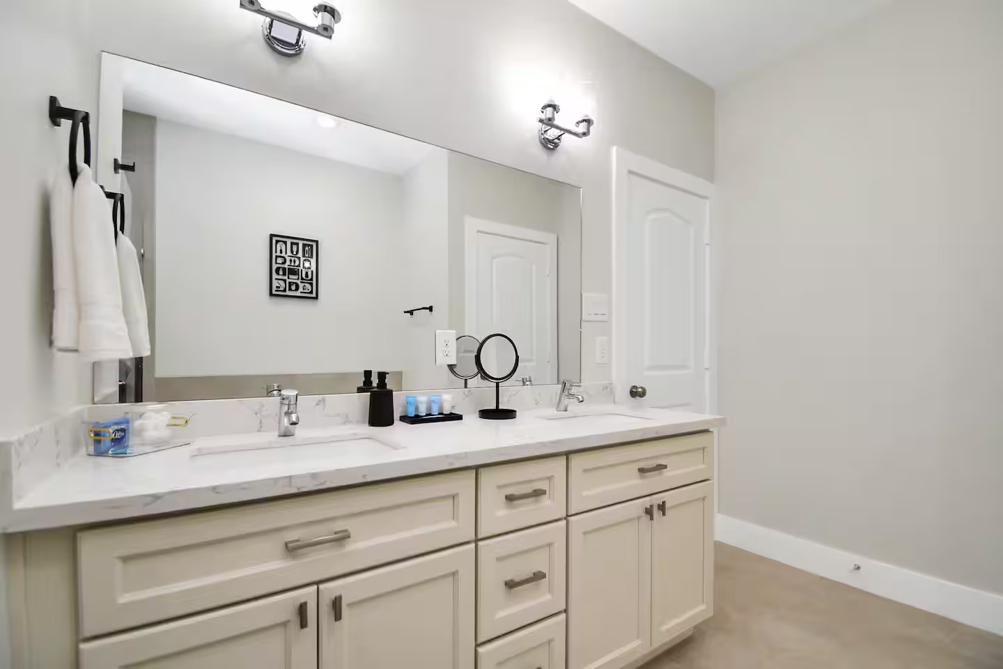 5718 Beall Street, Unit D Houston, TX 77091 - Photo 21 of 41 a bathroom with double vanity sinks and a mirror