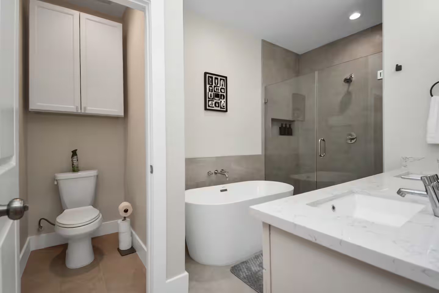 5718 Beall Street, Unit D Houston, TX 77091 - Photo 24 of 41 a bathroom with a toilet sink and mirror