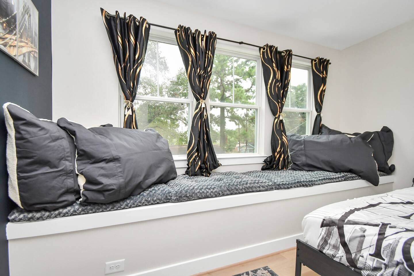5718 Beall Street, Unit D Houston, TX 77091 - Photo 29 of 41 a living room with furniture and a large window