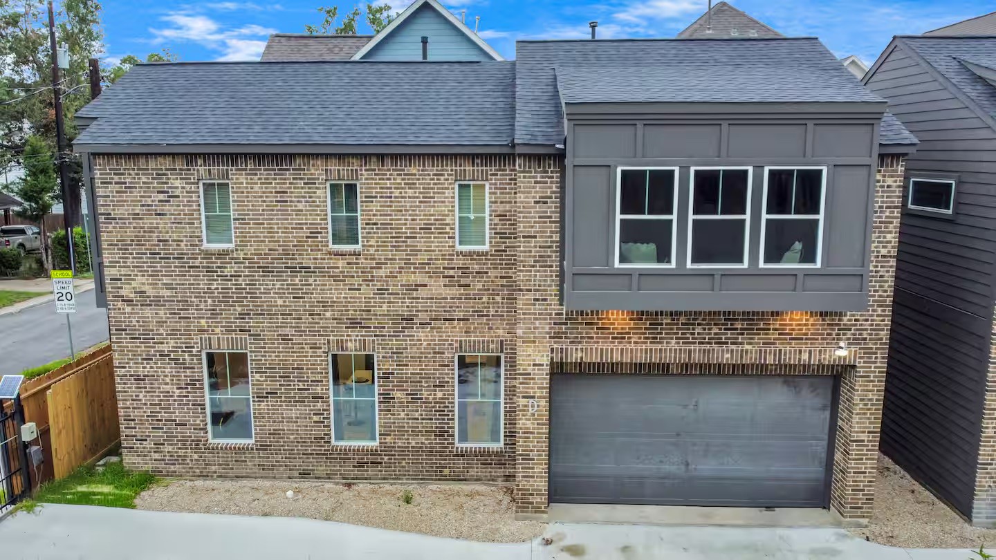 5718 Beall Street, Unit D Houston, TX 77091 - Photo 41 of 41 a front view of a house with a yard