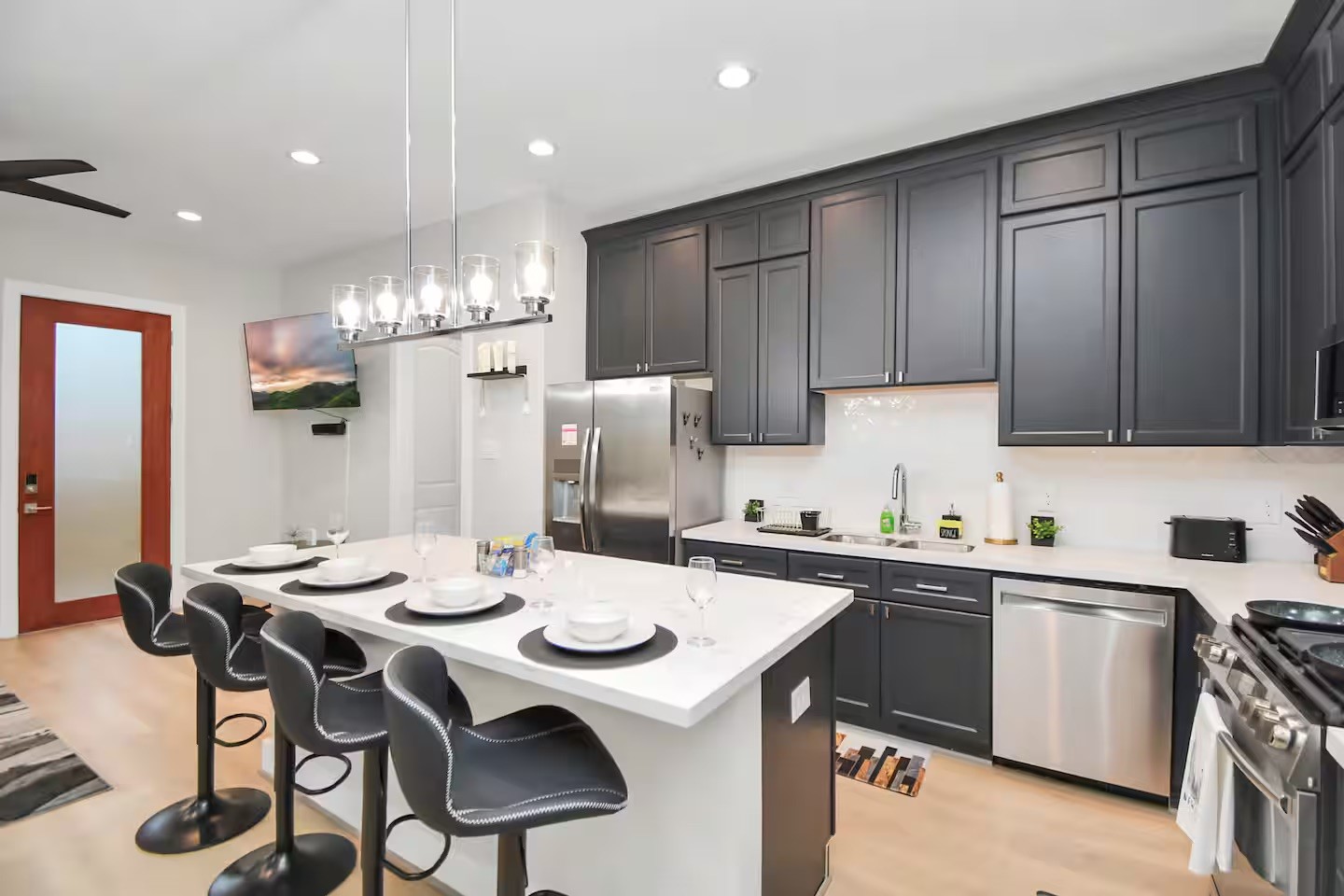 5718 Beall Street, Unit D Houston, TX 77091 - Photo 5 of 41 a kitchen with a sink cabinets and counter space