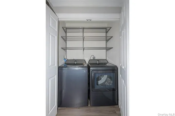 a utility room with washer and dryer