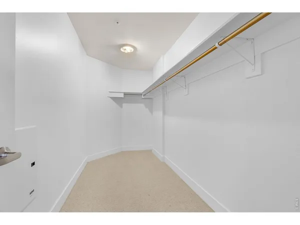 a workspace with furniture and a potted plant