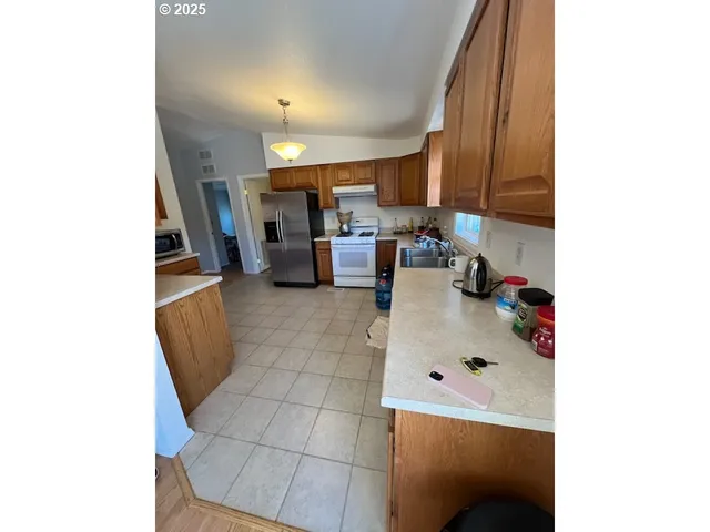 a room with furniture and a flat screen tv