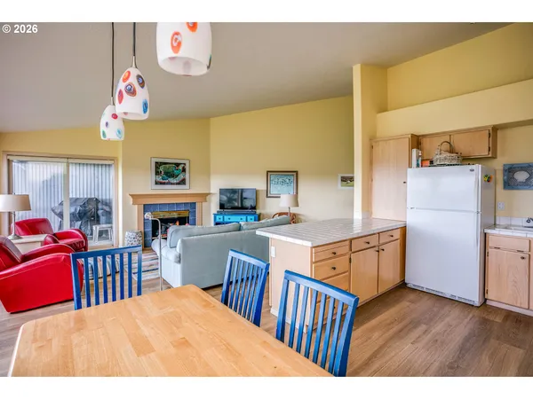 a kitchen with a sink cabinets and appliances