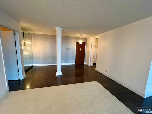 a kitchen with a stove and a microwave