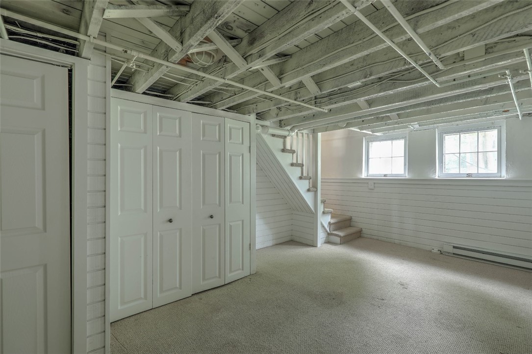 33 Beach Road Bristol, RI 02809 - Photo 26 of 37 Playroom (basement with laundry behind doors)