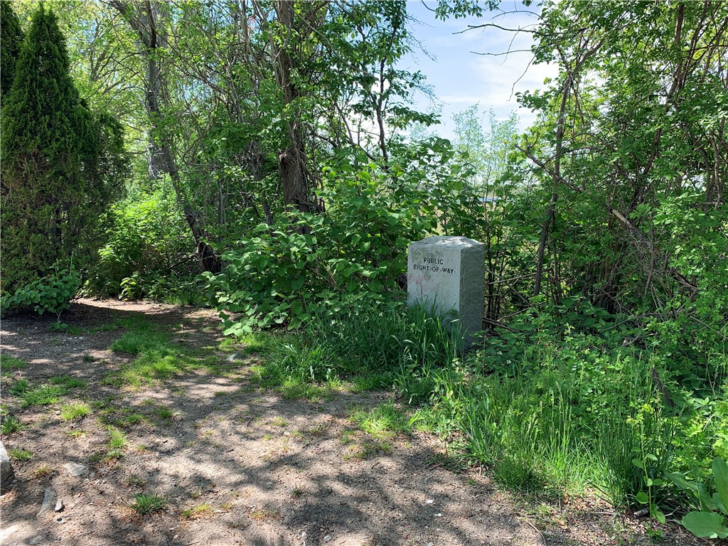 33 Beach Road Bristol, RI 02809 - Photo 33 of 37 Public access via a path to sandy beach on Narragansett Bay.