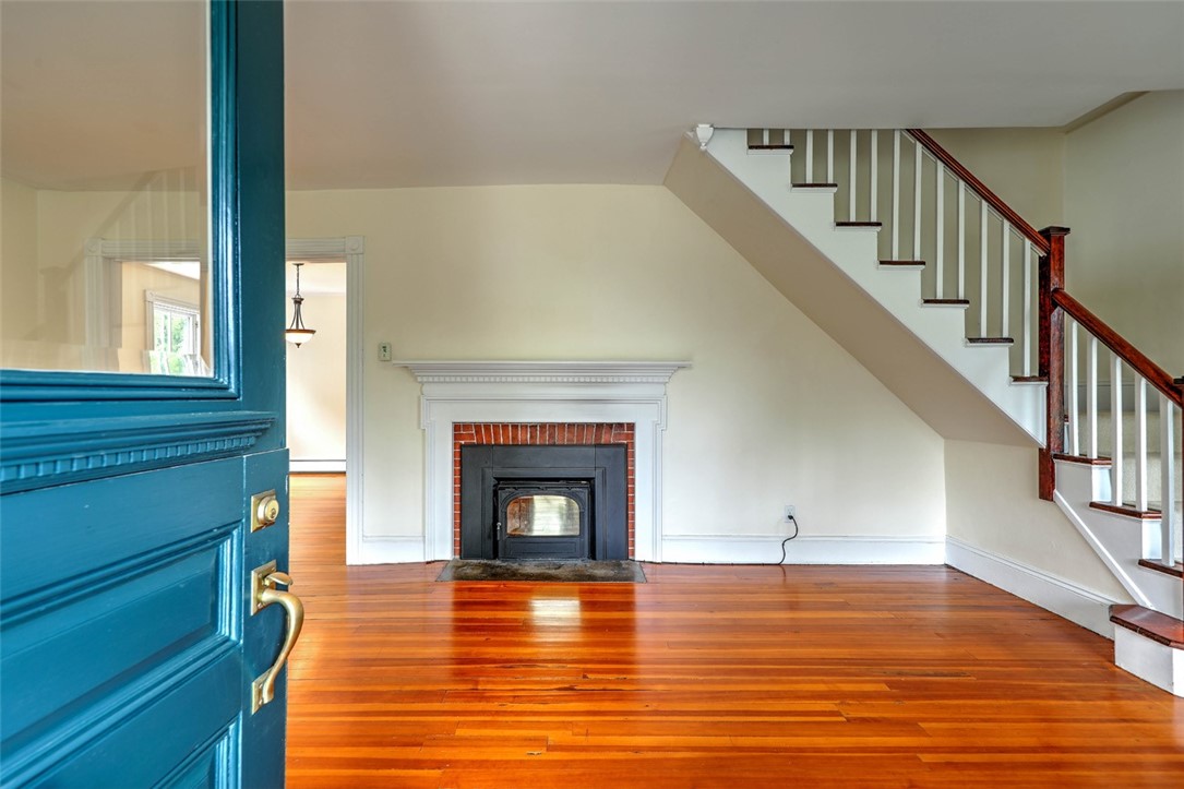33 Beach Road Bristol, RI 02809 - Photo 6 of 37 Living Room with Fireplace and Wood Burning Insert