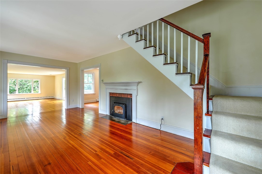 33 Beach Road Bristol, RI 02809 - Photo 7 of 37 Living Room Opening to Family Room
