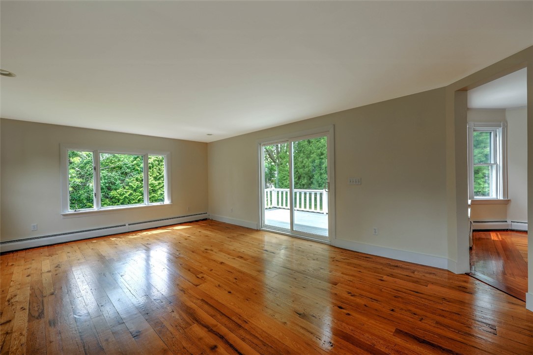 33 Beach Road Bristol, RI 02809 - Photo 8 of 37 Family Room with Sliders to Deck