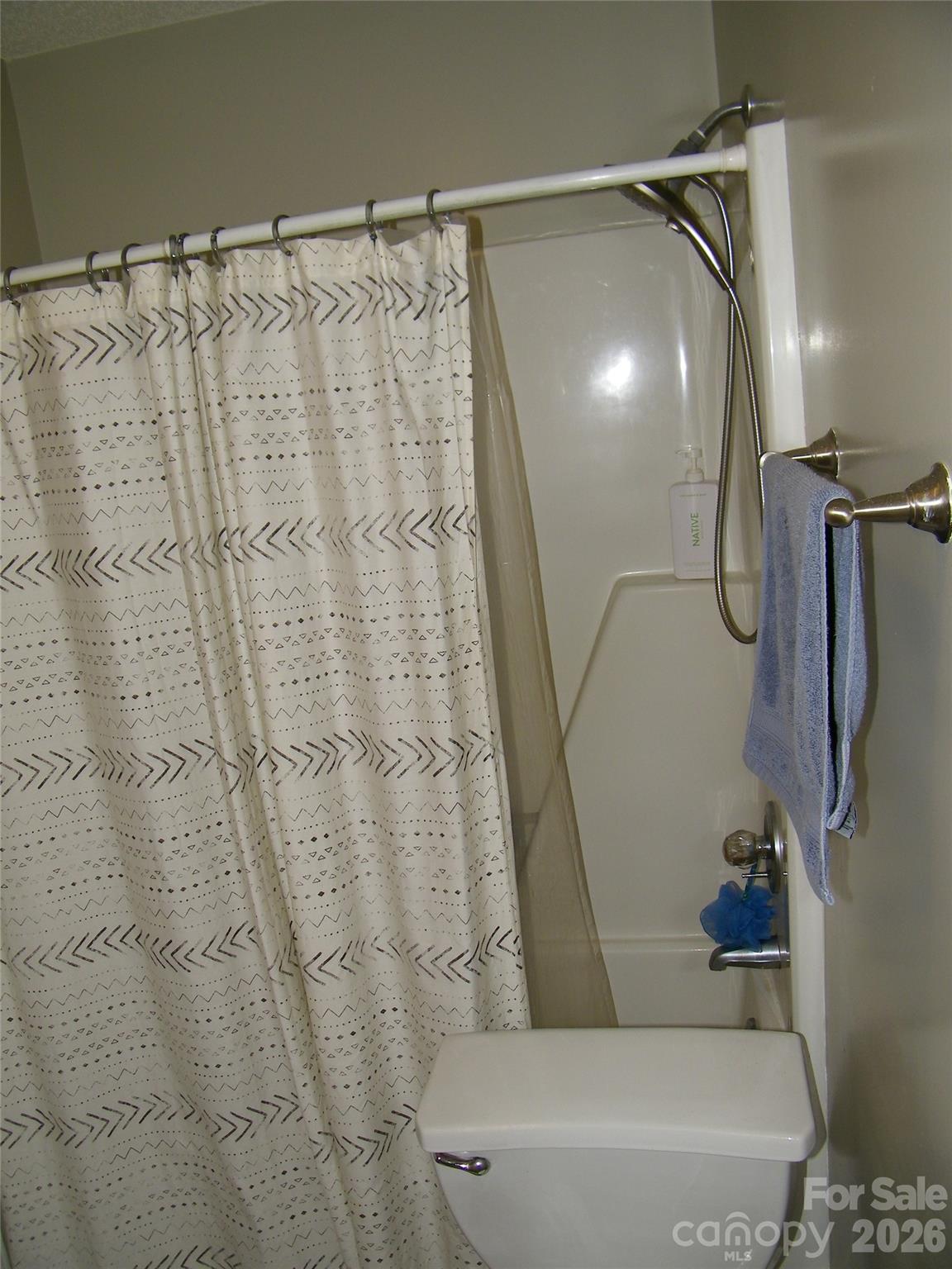 609 Redah Avenue Locust, NC 28097 - Photo 25 of 37 a bathroom with a shower and a tub