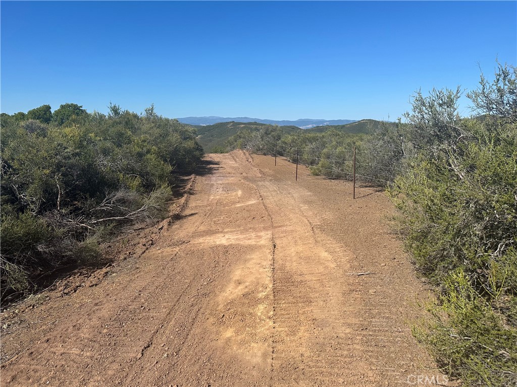 7157 Amber Ridge Court Lakeport, CA 95453 - Photo 2 of 7 a view of a yard with mountain view
