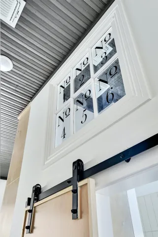 a kitchen with stainless steel appliances granite countertop a sink a stove and cabinets