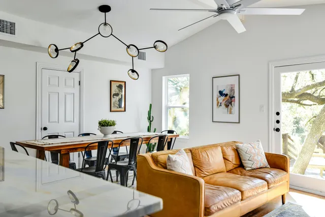 a bathroom with a sink a mirror and a shower