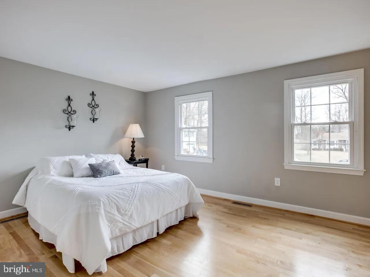 6502 Shipyard Place Falls Church, VA 22043 - Photo 12 of 19 a bedroom with a bed and window