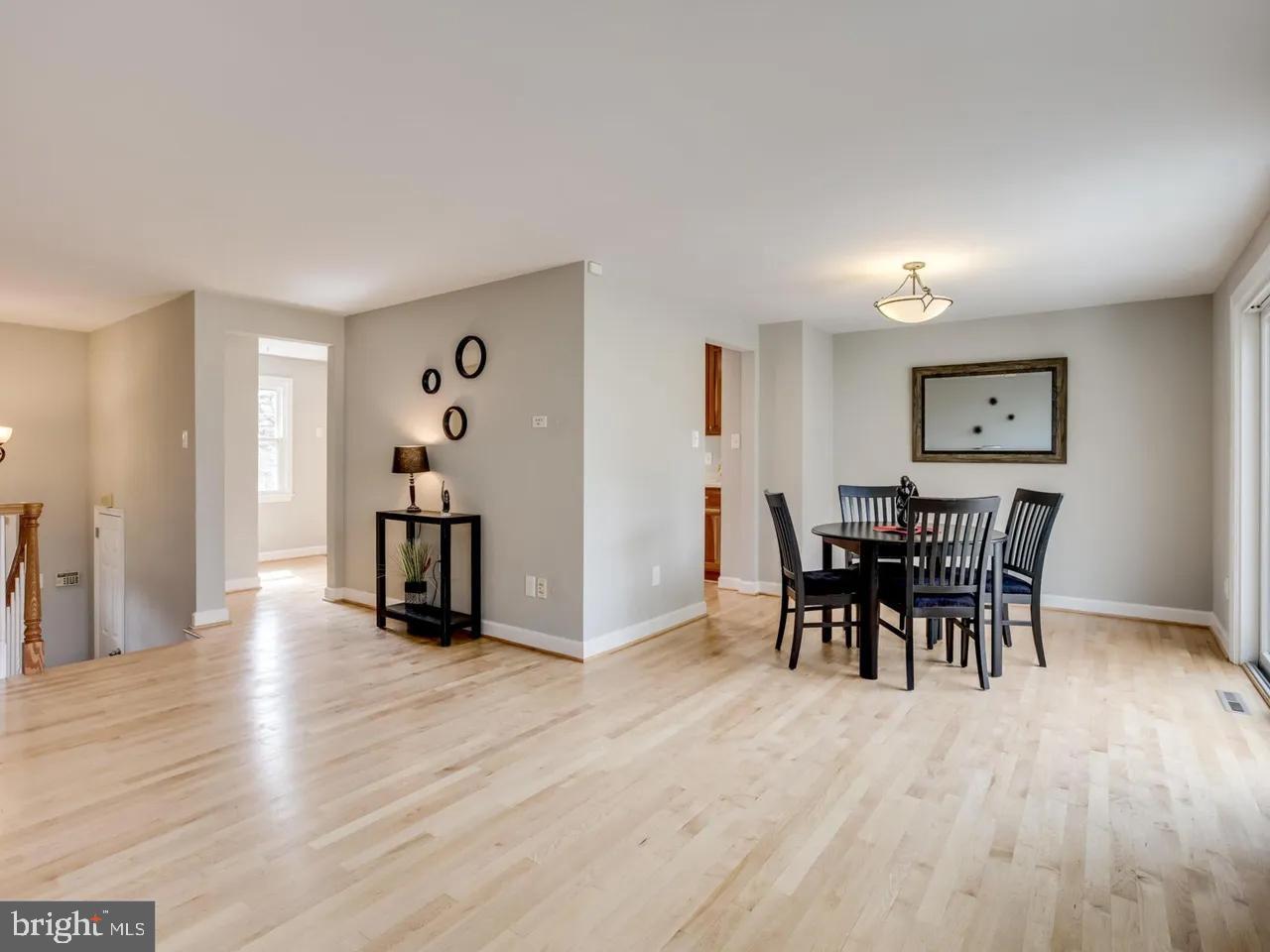 6502 Shipyard Place Falls Church, VA 22043 - Photo 6 of 19 a view of a dining room with furniture and wooden floor