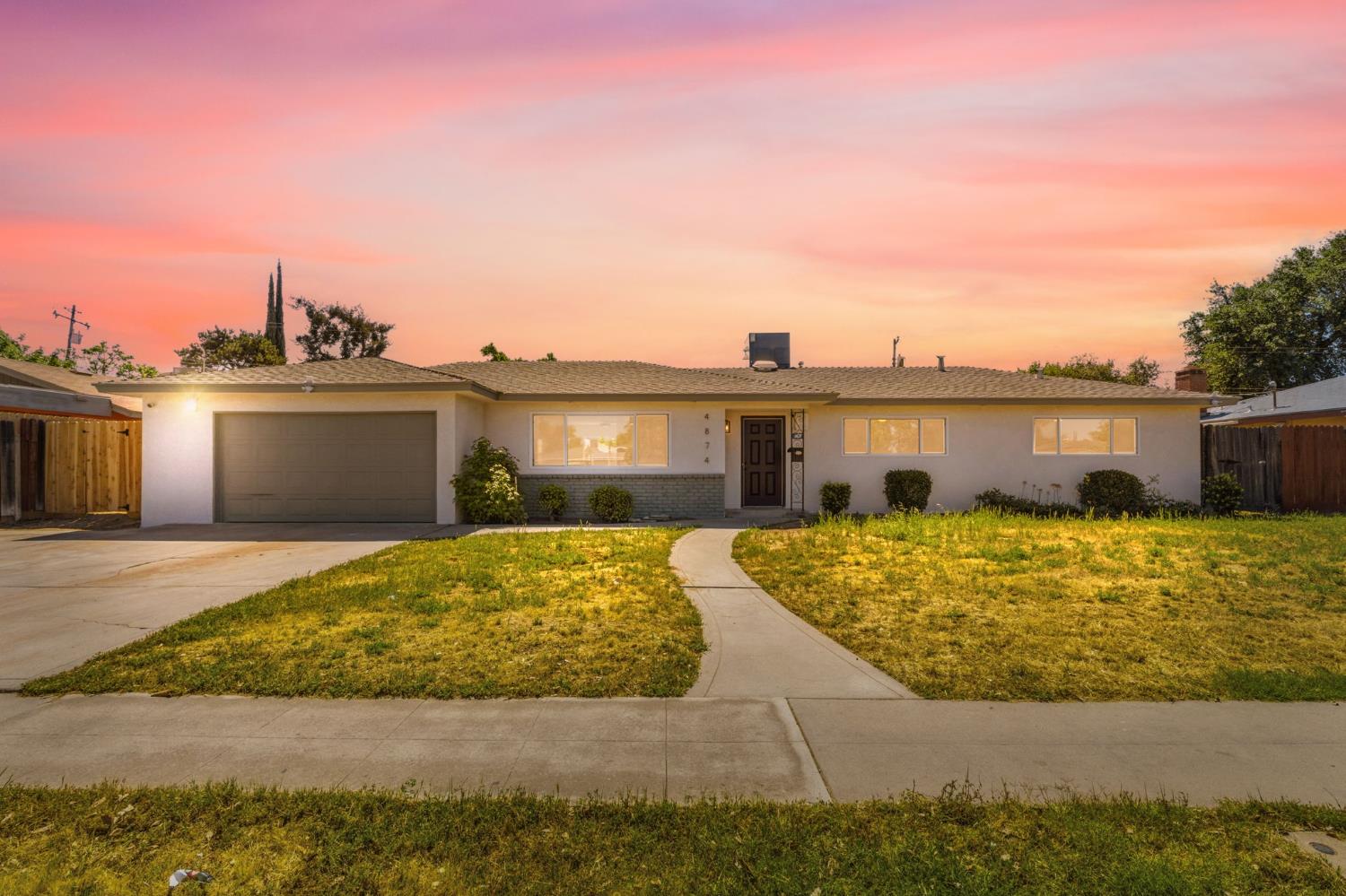 4874 East Clinton Way Fresno, CA 93703 - Photo 1 of 39 Twilight, altered photo