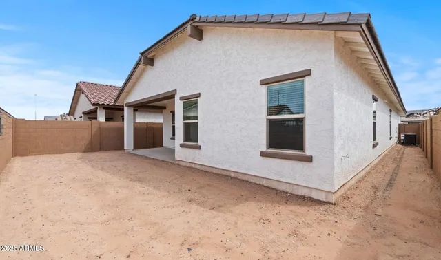 a view of a house with a large window