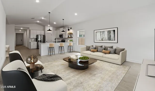 a living room with furniture and a couch