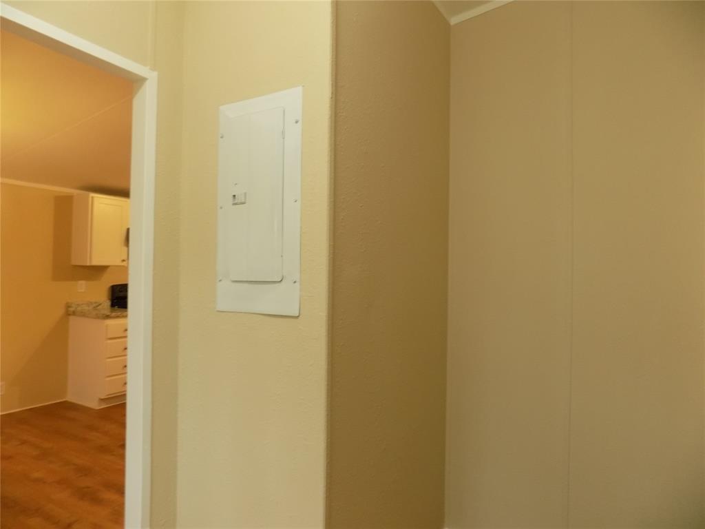 203 South Ridgeview Court Azle, TX 76020 - Photo 16 of 29 Wiring box conveniently located in laundry room.