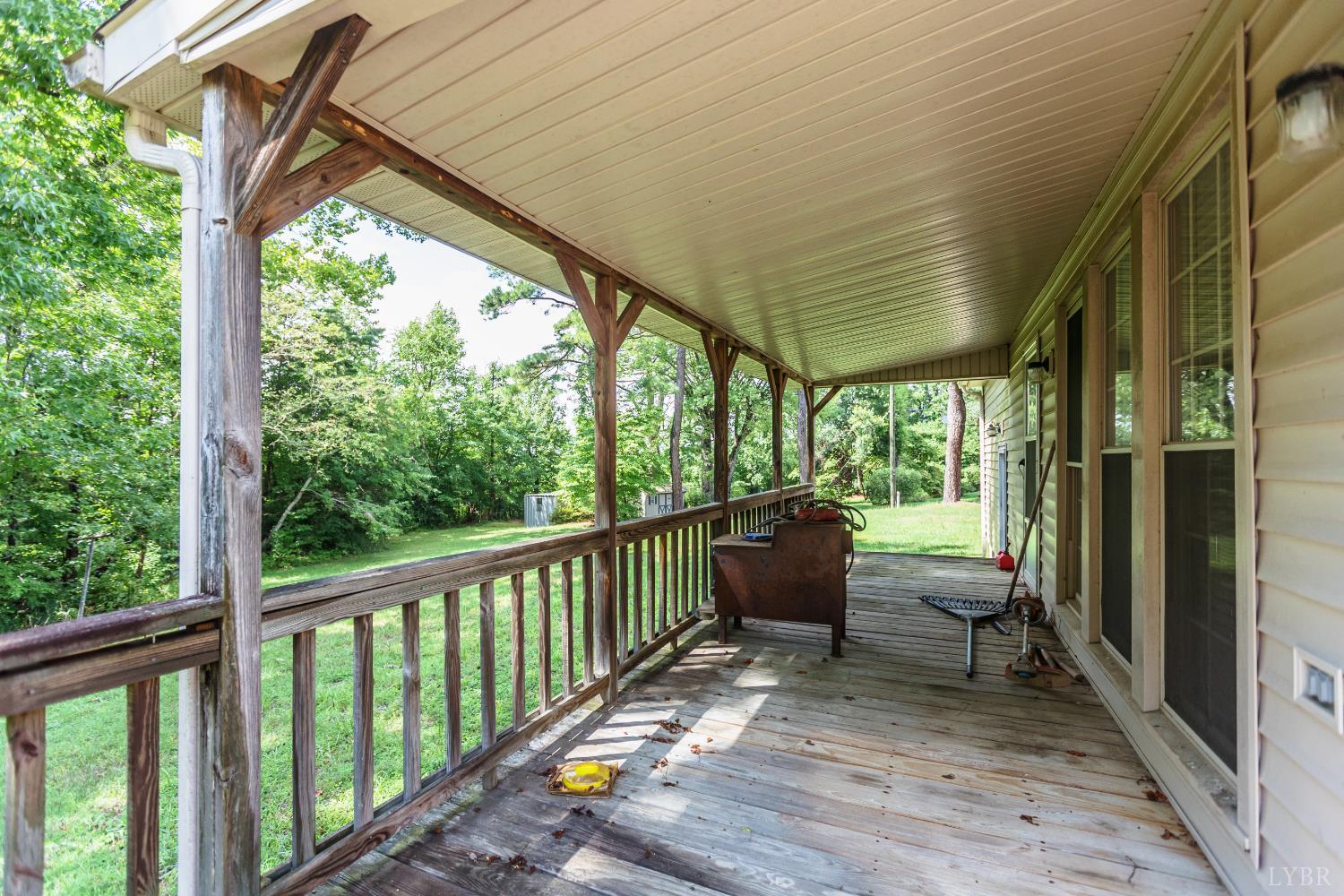 1338 Wickliffe Road Brookneal, VA 24528 - Photo 23 of 24 a view of porch with furniture and garden